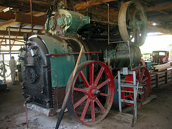 A twin cyclinder steam engine in operating condition on display at the Gayndah Museum